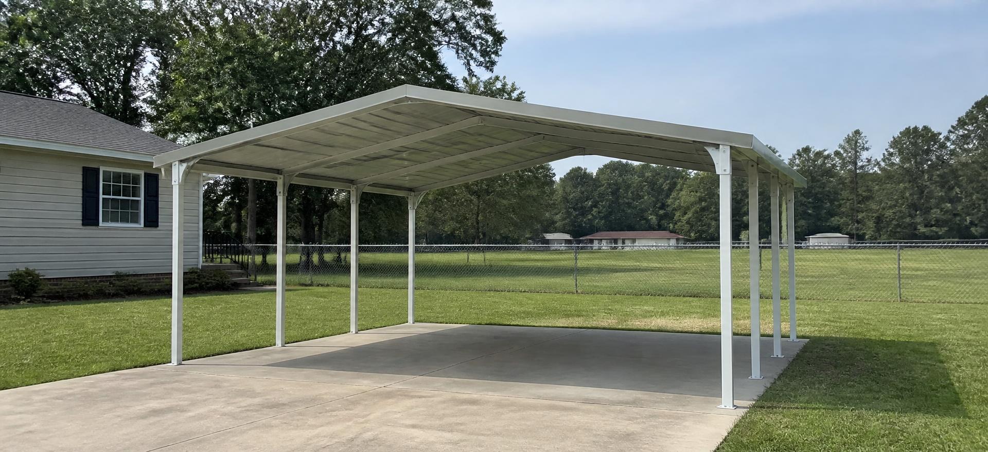 Concept photograph of a white tube-frame steel carport with a light grey roof over a concrete pad beside a single-storey house; example configuration, not a real project.