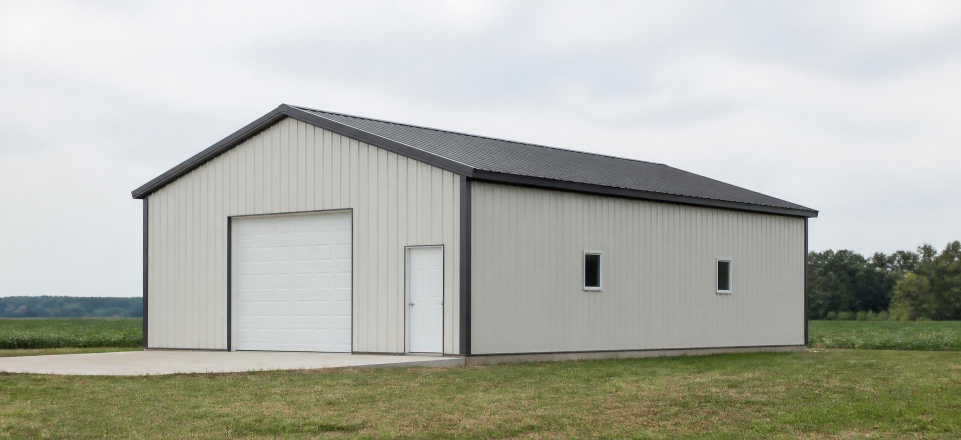 Concept photograph of a 30 by 40 foot enclosed steel garage with off-white vertical-rib walls, a dark shallow-pitch gable metal roof, one closed sectional overhead door and a walk door on the gable end and two small sidewall windows on a concrete slab in flat farmland; illustrative configuration, not a real project.